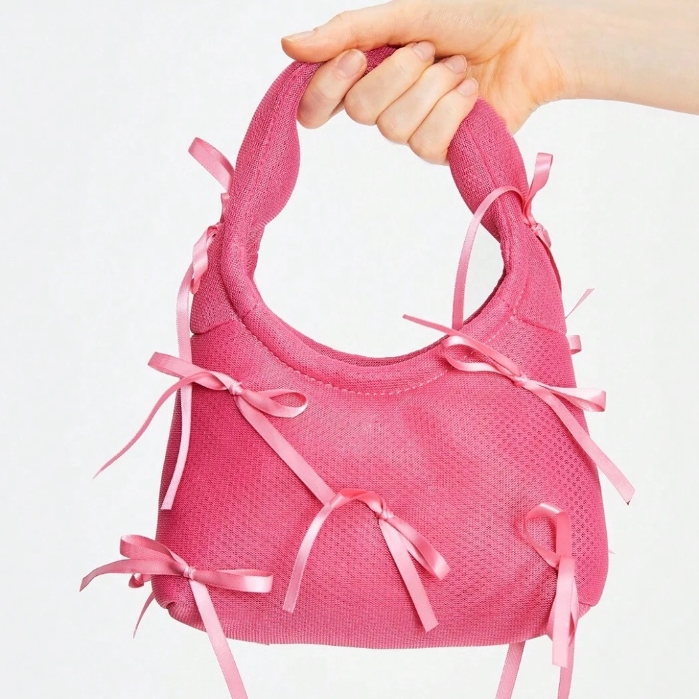 Product Measurements Size	Bag Length	Bag Width	Bag Height	Handle Height one-size
